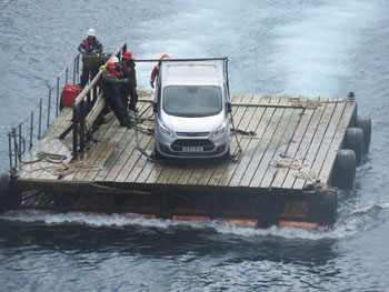 A vehicle being rafted ashore