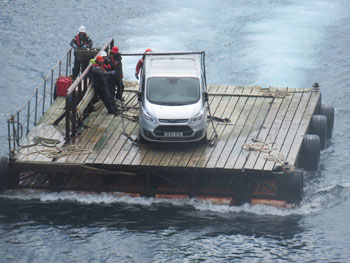 A vehicle being rafted ashore