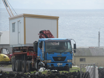 IT unit being transported on the island's articulated lorry.