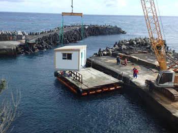 One of the new IT units being hoisted ashore...