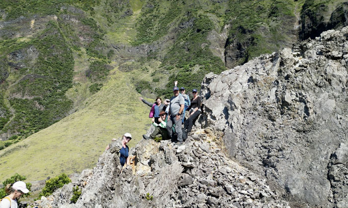 A view from above of hikers atop the 1961 volcano.
