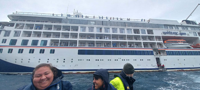 Post Office and Tourism staff departing the MS Hanseatic Spirit