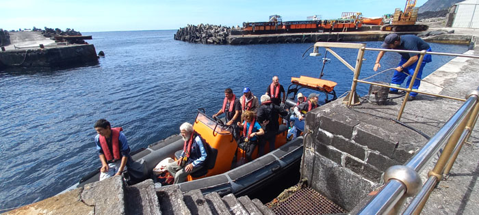 Leaving the harbour at the end of their visit.