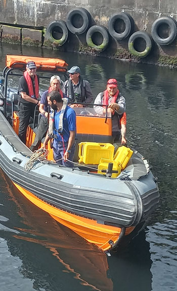 The crew of the Nyamezela arriving in the harbour