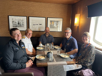 Administrator Philip Kendall and his wife Louise take lunch on board the National Geographic Explorer