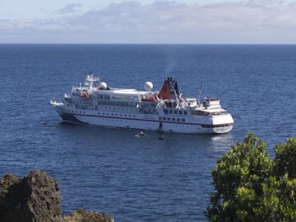Cruise ship MS Bremen off Tristan da Cunha, 1969