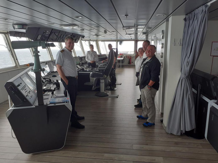 Islanders (right) on the bridge of the MS Hanseatic Spirit