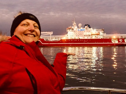 Sue Ivory admires the SA Agulhas II during a harbour boat trip before entering quarantine
